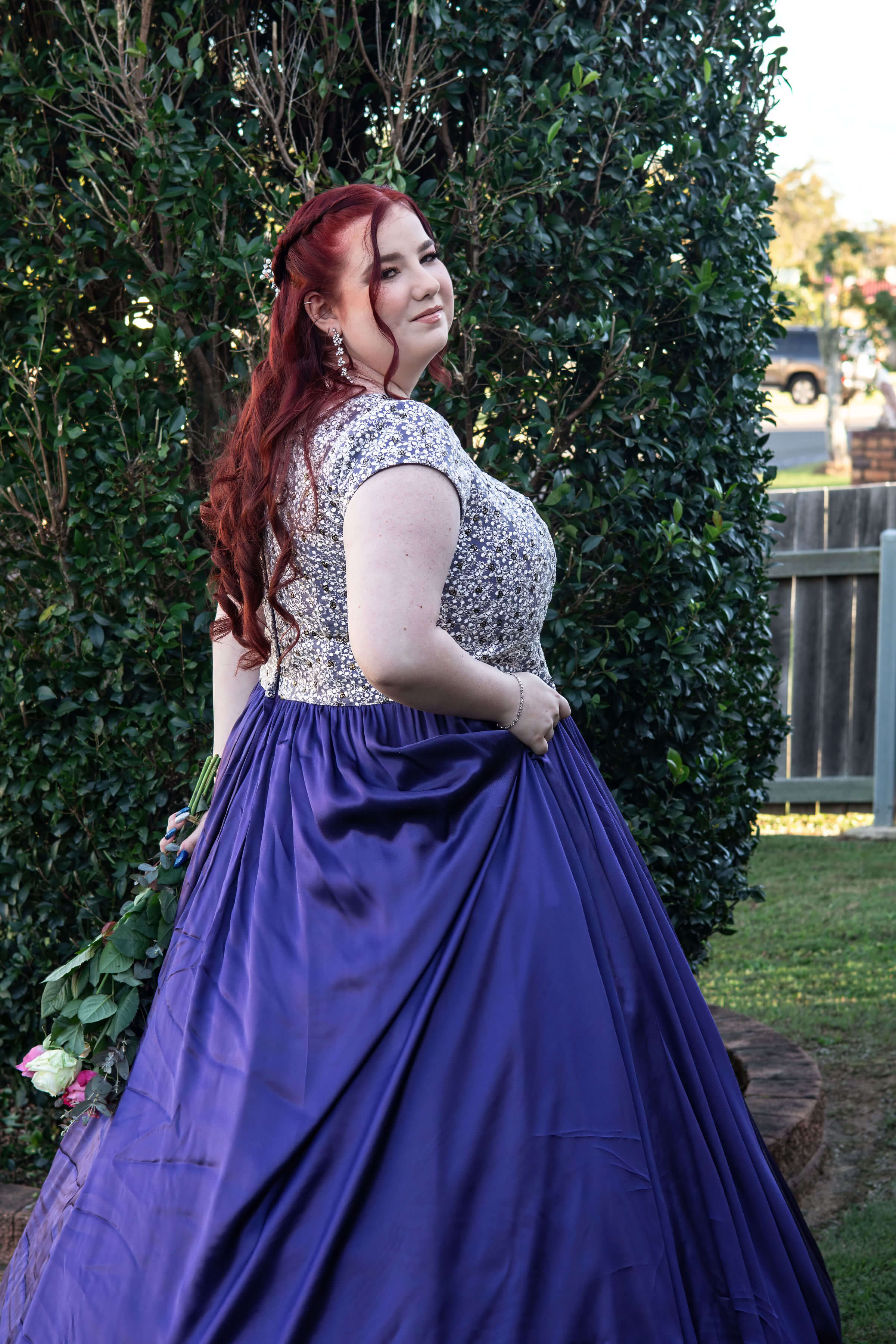 a young women in a beautiful dress