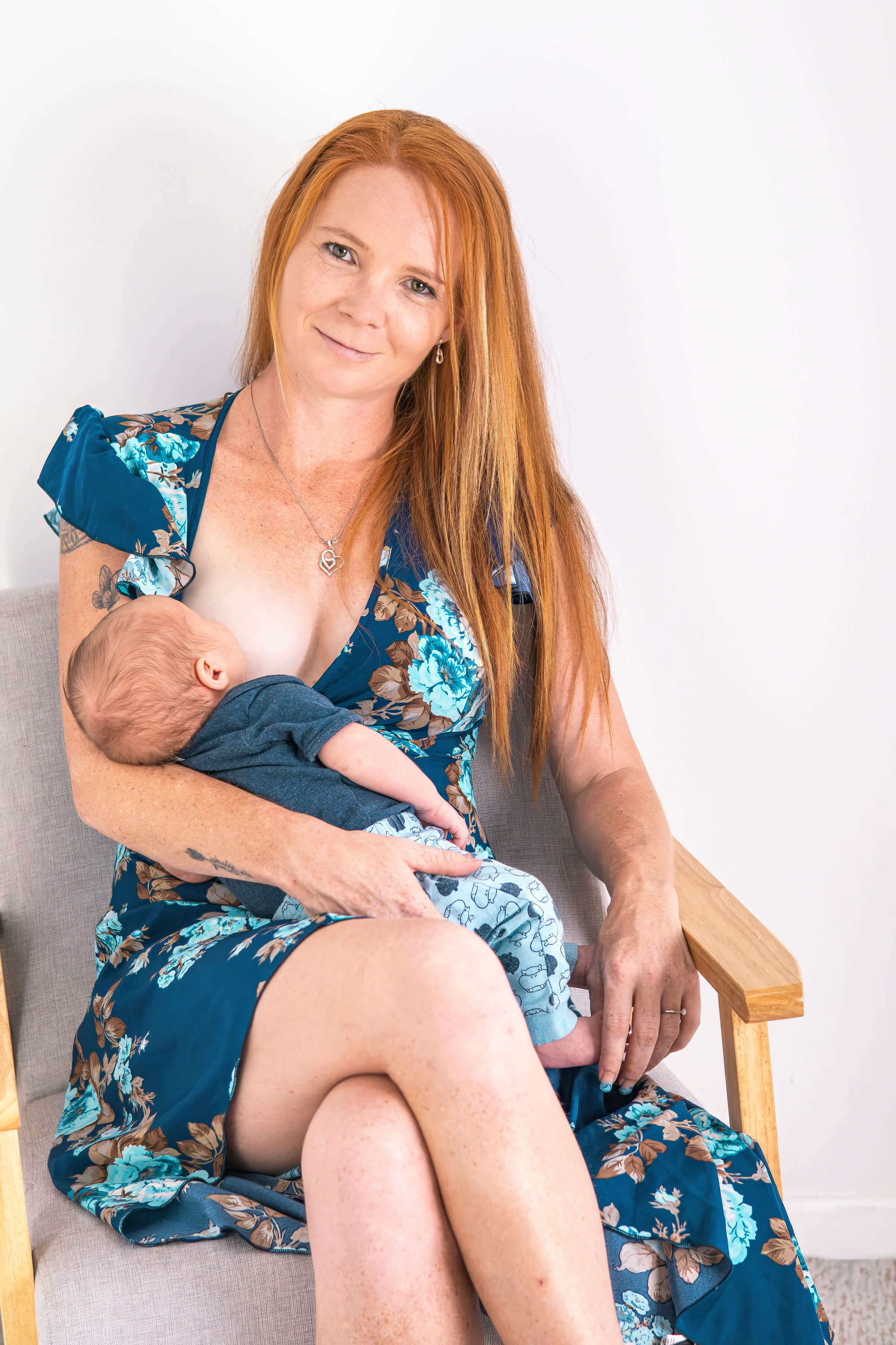 a women breastfeeding her baby