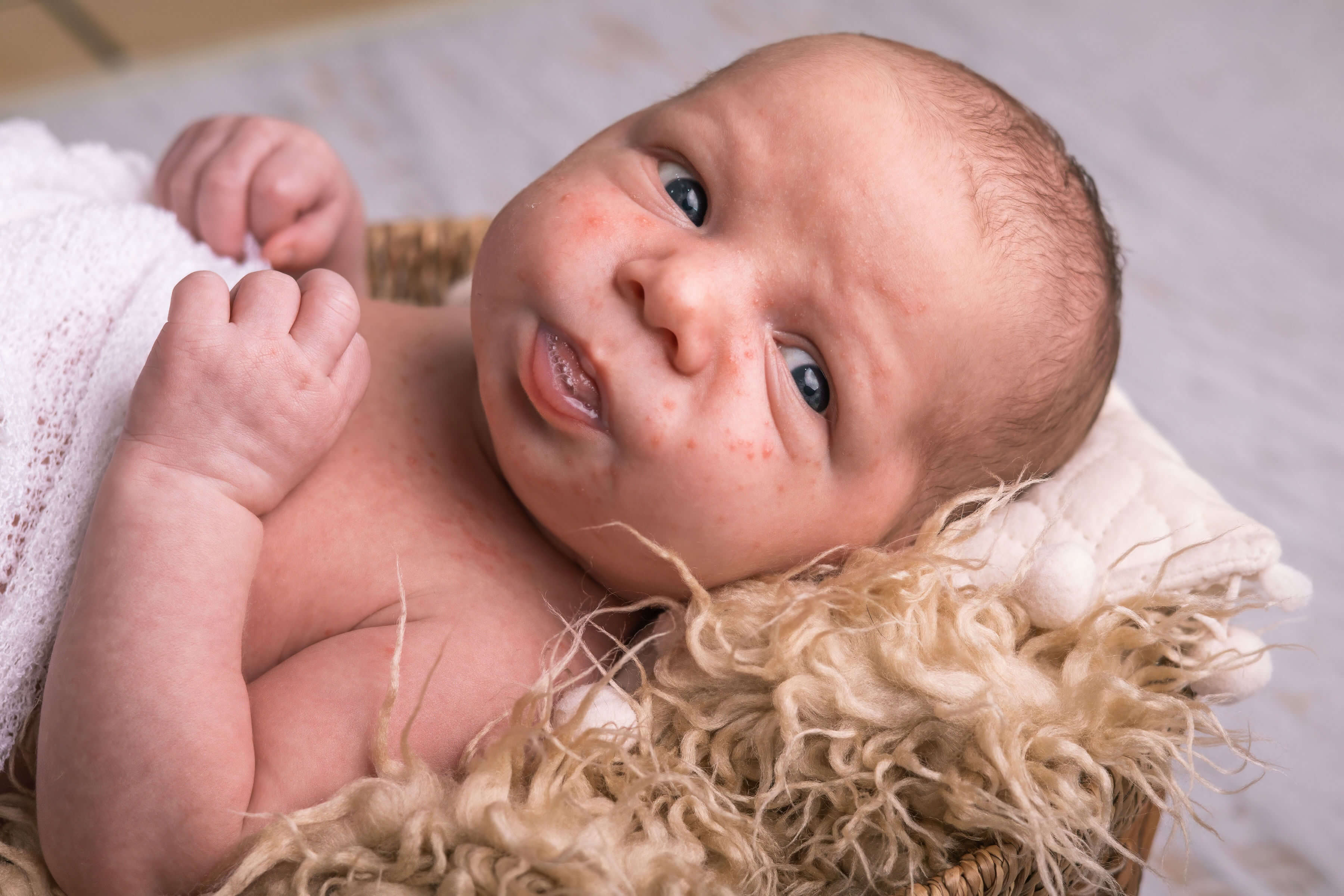 a baby looking at the camera